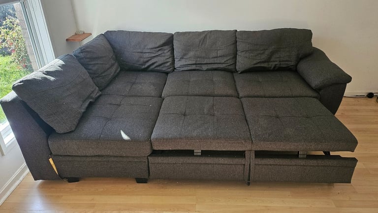 Large corner sofa with storage and pull out bed