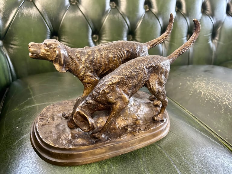 image for BRONZE, A PAIR OF OTTER HOUNDS ON RECTANGULAR ROUNDED NATURALISTIC GROUND, UNSIGNED. (9.75IN)
