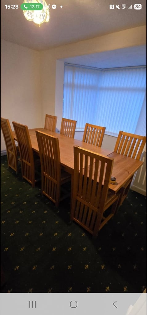 8 seather dining room table and chairs