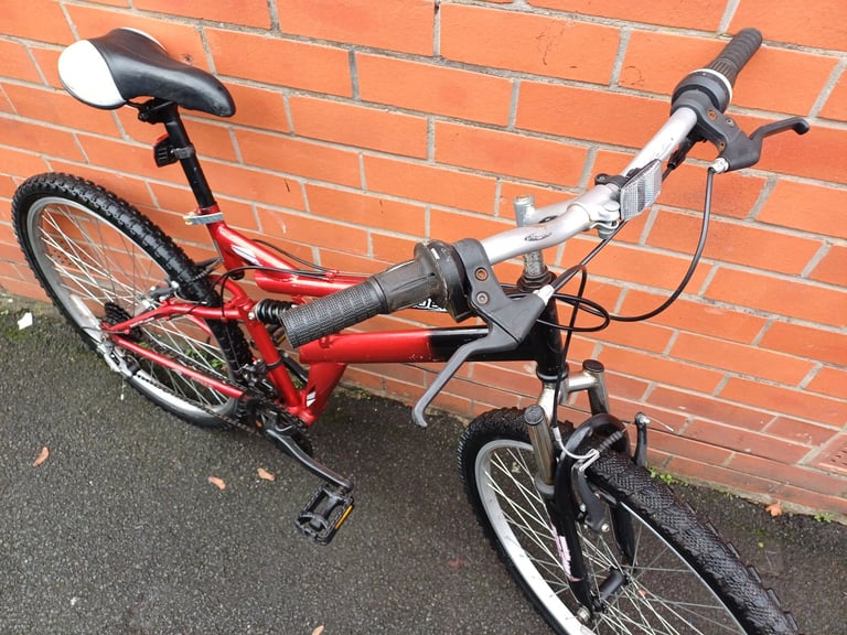 Bentini Phoenix Mountain , City Bike - full suspension , comfortable seat , good brakes .