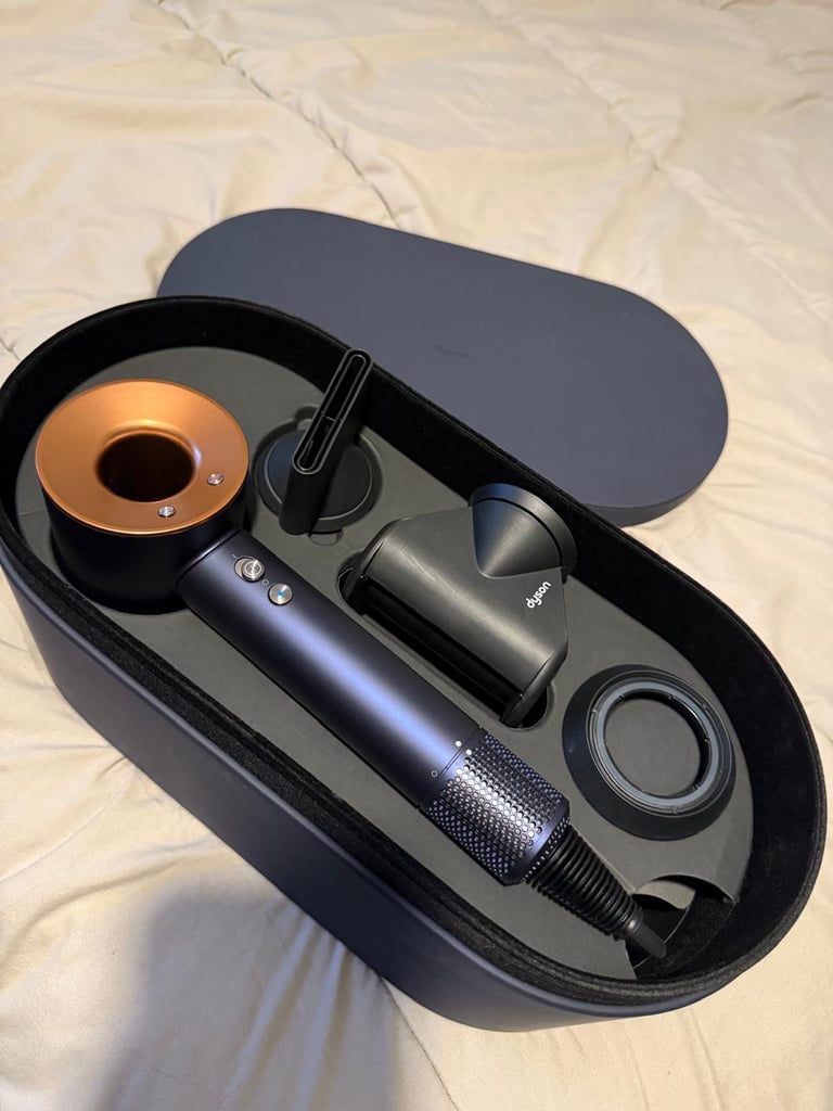 Dyson supersonic hairdryer with box and all accessories brand new used twice it just isn’t for me