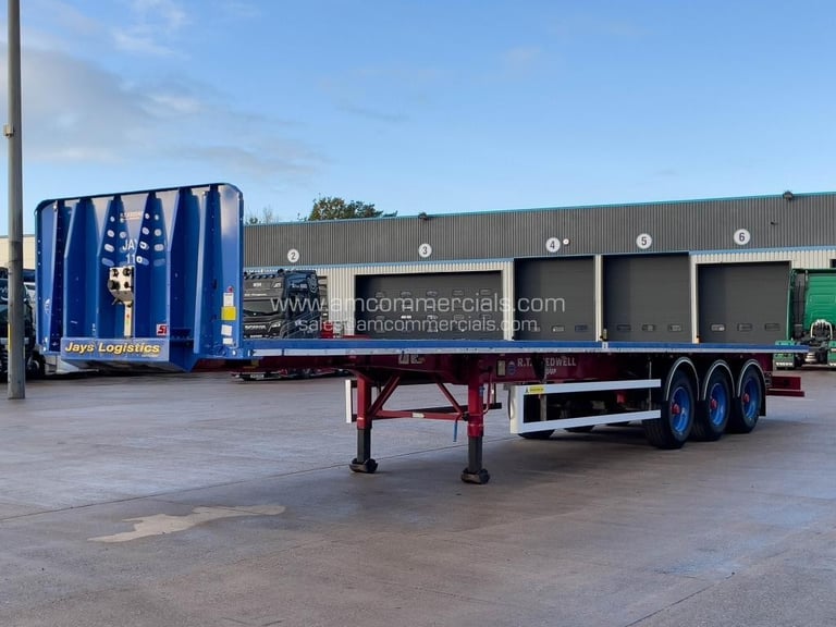 SDC TRI AXLE FLAT BED TRAILER 
