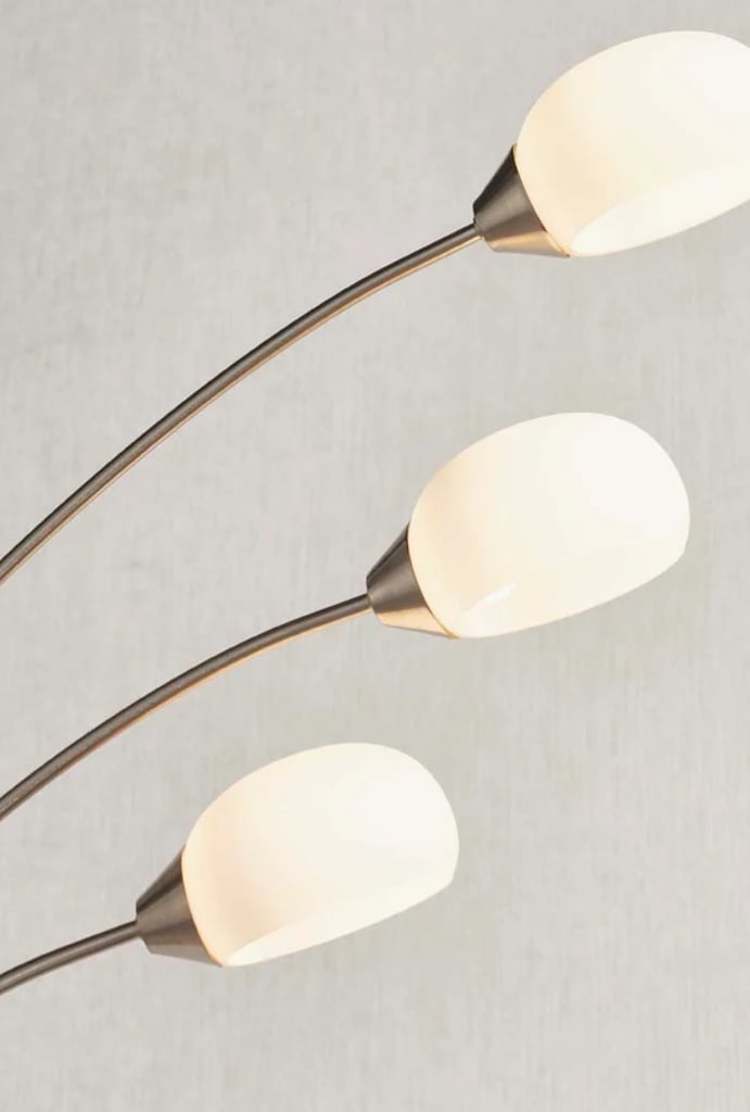 LED Modern floor lamp boasting a satin nickel finish