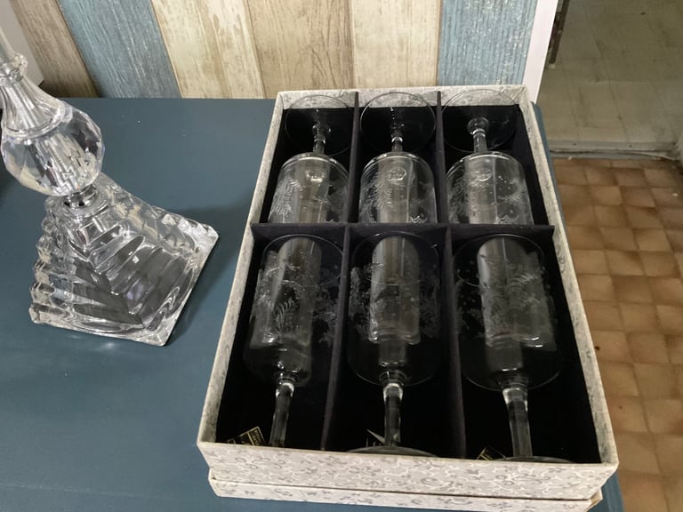 Six Sherry glasses, and display stand for stem glasse