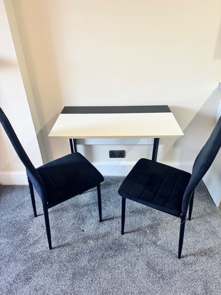 Drop leaf dining table and two chairs