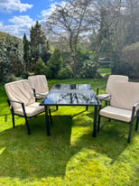 Metal garden table and 4 chairs 