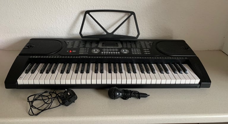 61 Keys Electronic Keyboard & Microphone 