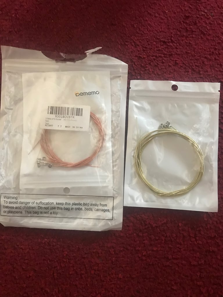 image for Guitar strings, two sets, brand new.