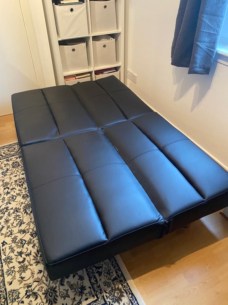 Faux leather sofa bed