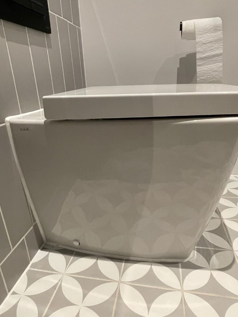 Vitra back to wall toilet with soft closing toilet seat 