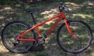 Islabike Beinn 24 red in great condition.  Age 7+.  Can courier.  Isla bike