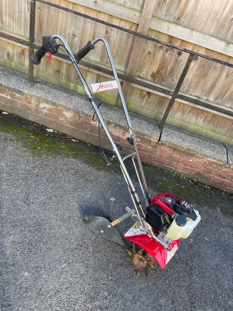 image for Honda Mantis 4 stroke petrol tiller with plough  attachment 