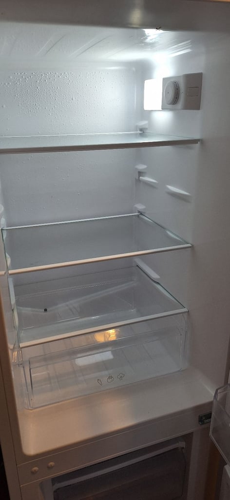 LOGIK fridge freezer size  H 142cm like new one year old 