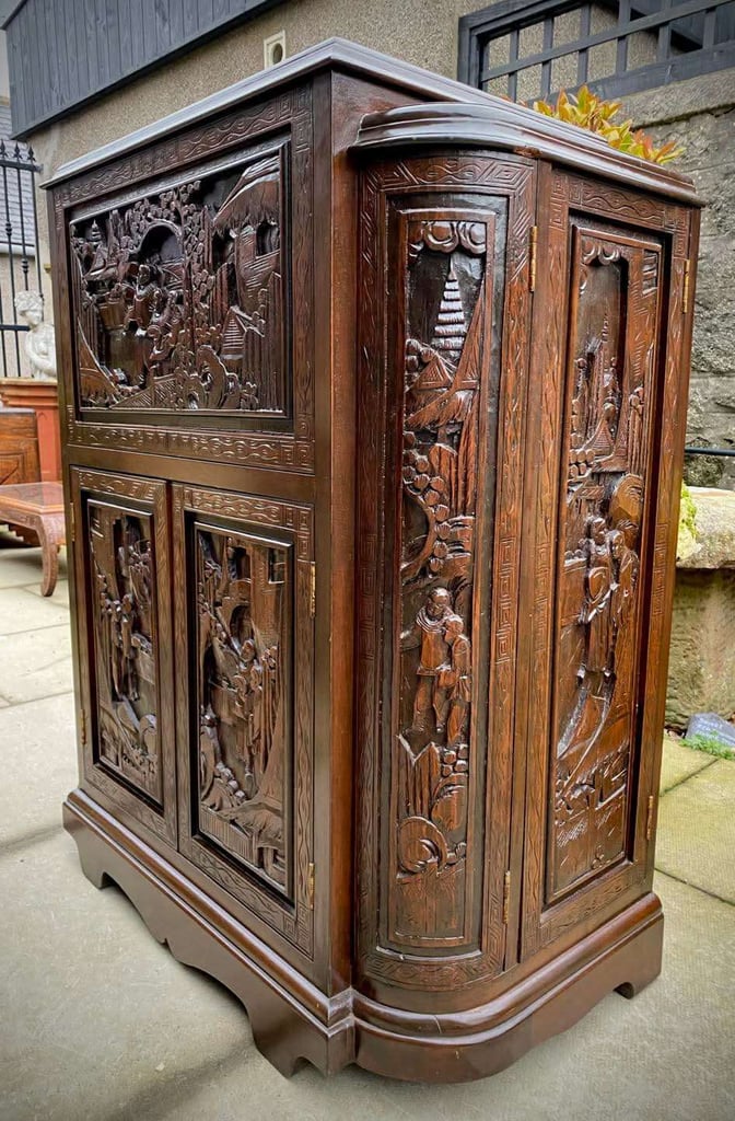 20th century Chinese heavily carved camphor wood cocktail bar cabinet