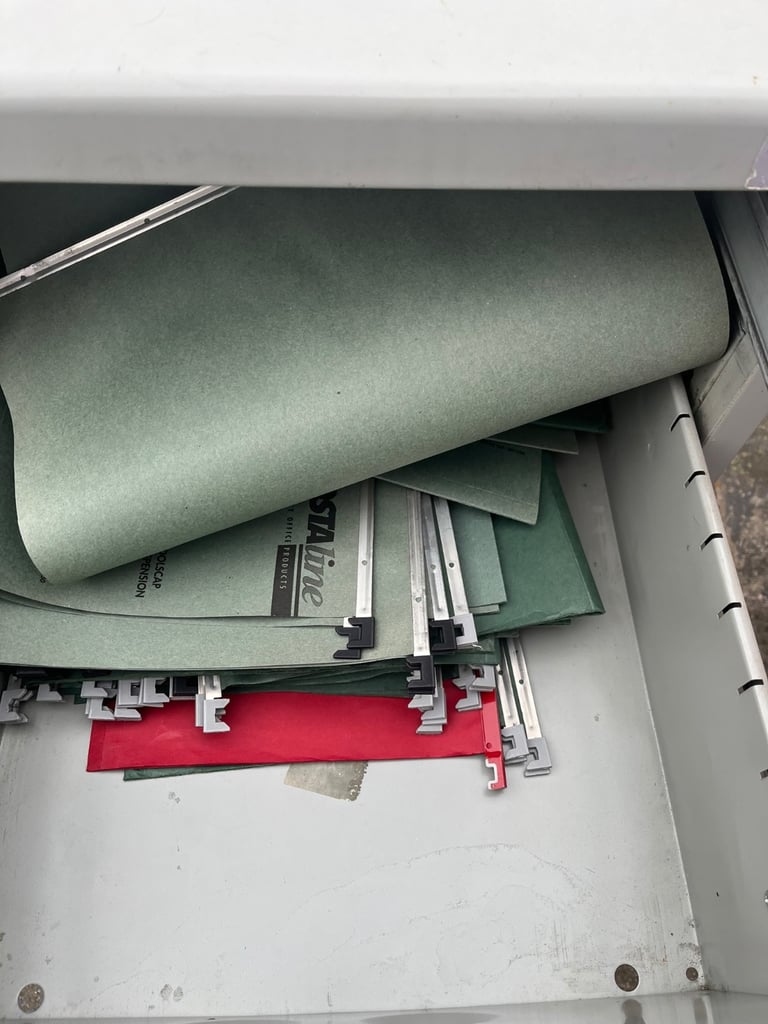 METAL 3 DOOR FILING CABINET WITH SOME FILES