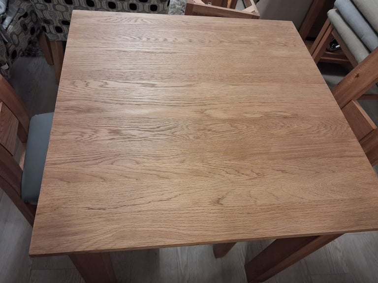 Solid oak 2 seater table plus pair of Oakfurnuture land chairs vgcs