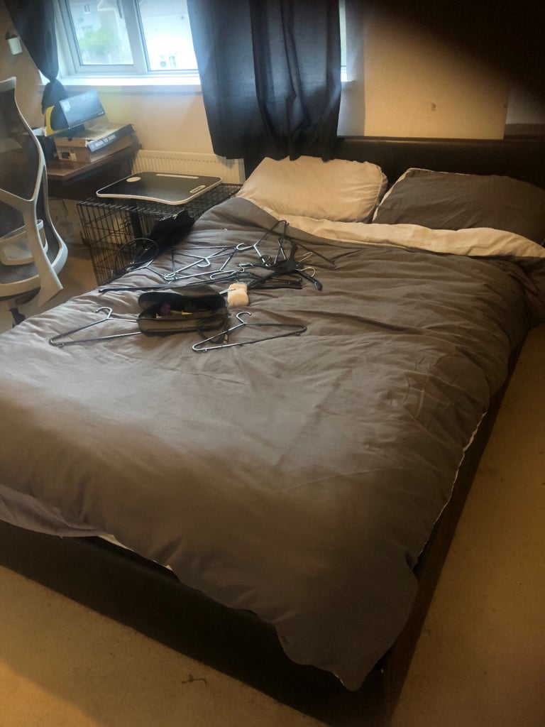 Double ottoman side lift up bed.   