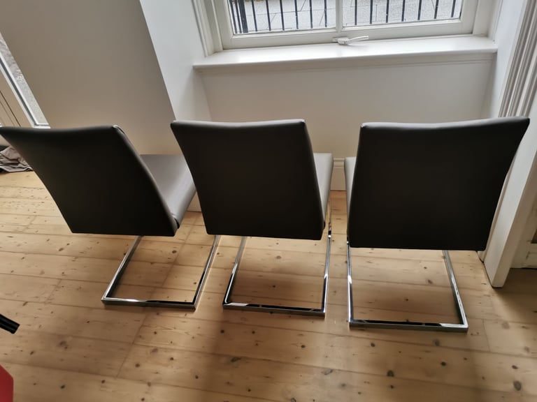 3x Grey leather and chrome dining chairs