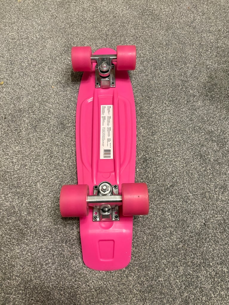 Pink plastic skateboard 