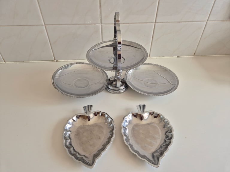 Folding Cake stand, chrome/tin. with 2 leaf shaped serving dishes. £10.00. lincoln
