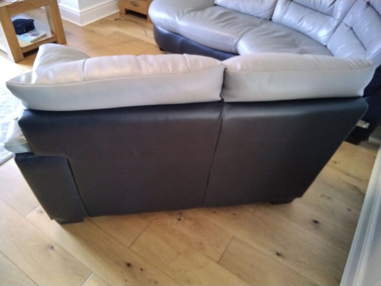 Black and grey leather corner unit.