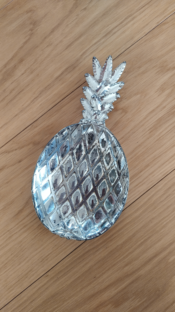 Non-tarnish, Silver plated, pineapple-shaped dish for snacks.