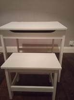 Child's wooden desk and stool