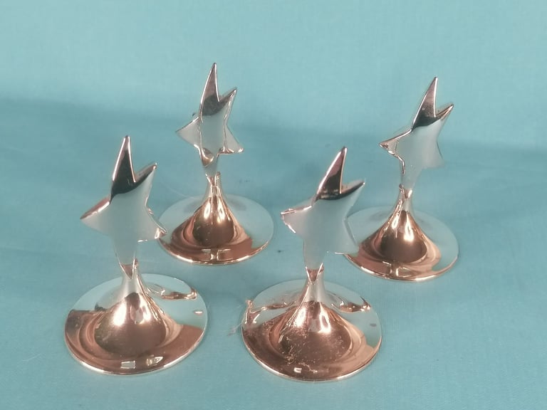 Stainless steel STAR PLACE CARD HOLDER. As seen.