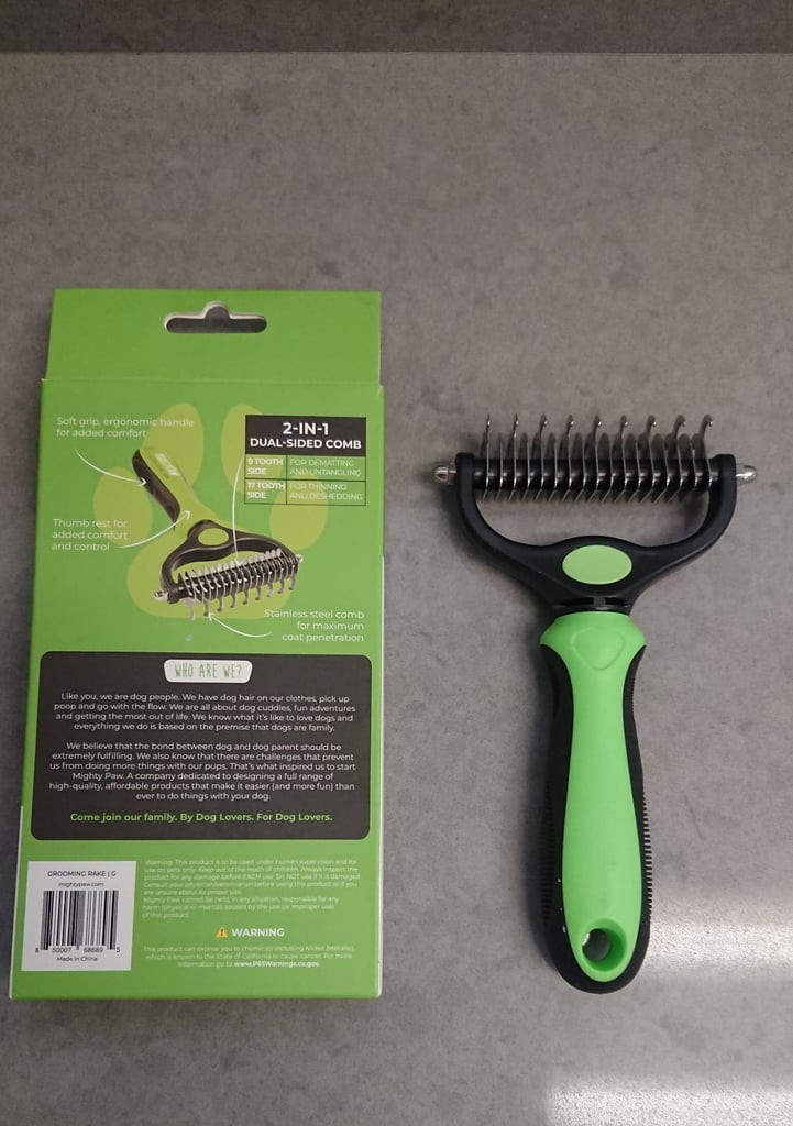 Dog grooming rake .new boxed 