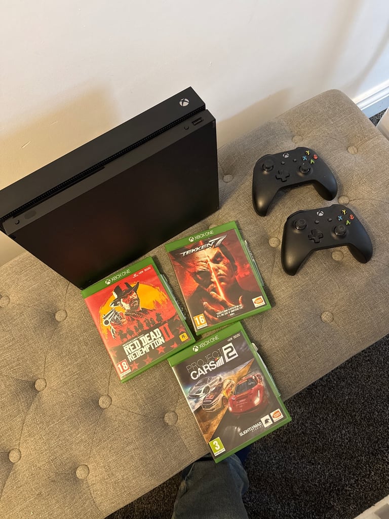 image for Xbox One X console with red dead 2