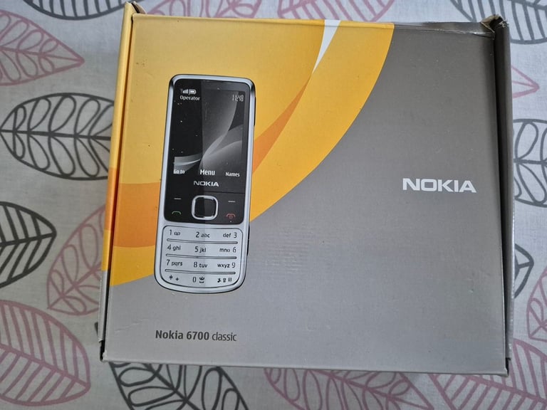 Nokia 6700 Classic with box, charger manual and accessories shown - retro vintage
