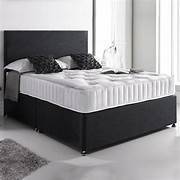 Luxury Divan Bed with Soft Mattress – Elegant and Functional Bedroom Piece
