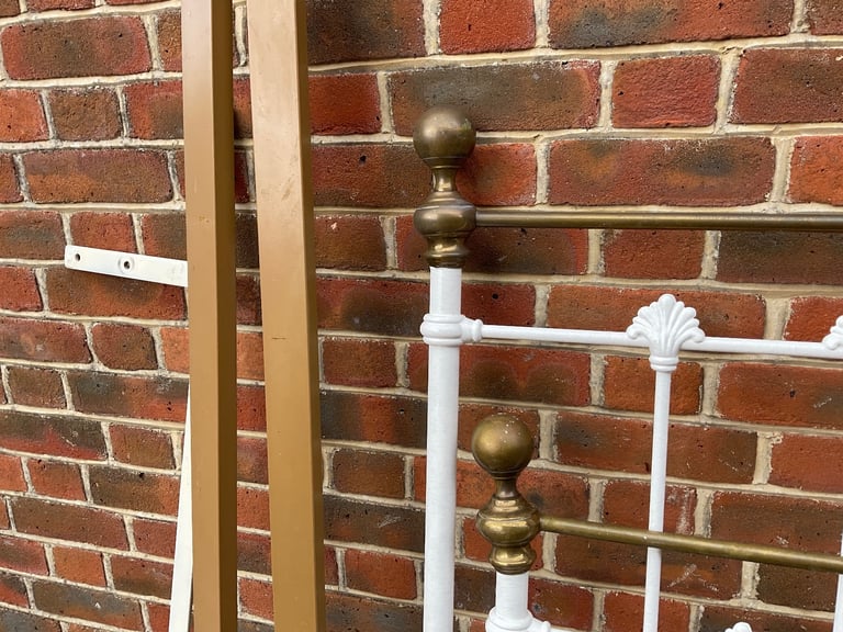 White wrought iron bedstead