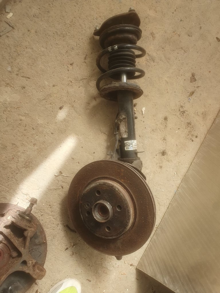 Mini one strut leg, o/s/f front complete used condition 