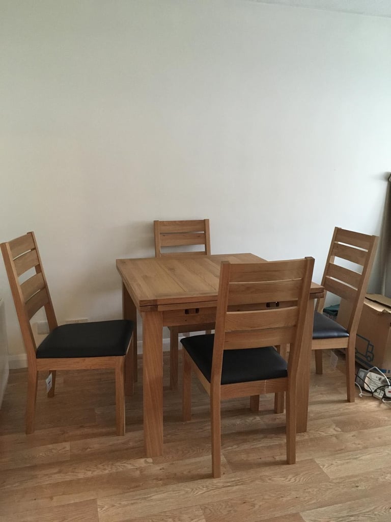 image for Wooden table (extendable) with four chairs 