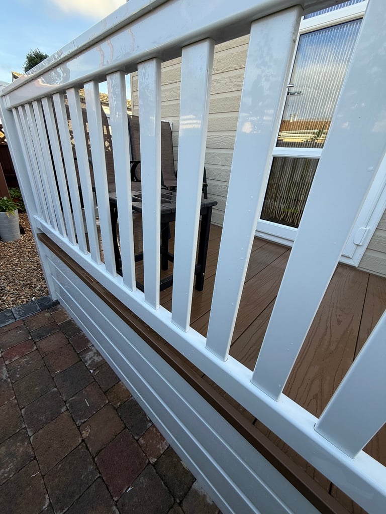 Verandah Composite decking, antique oak, great condition. All decking, rails, skirting.