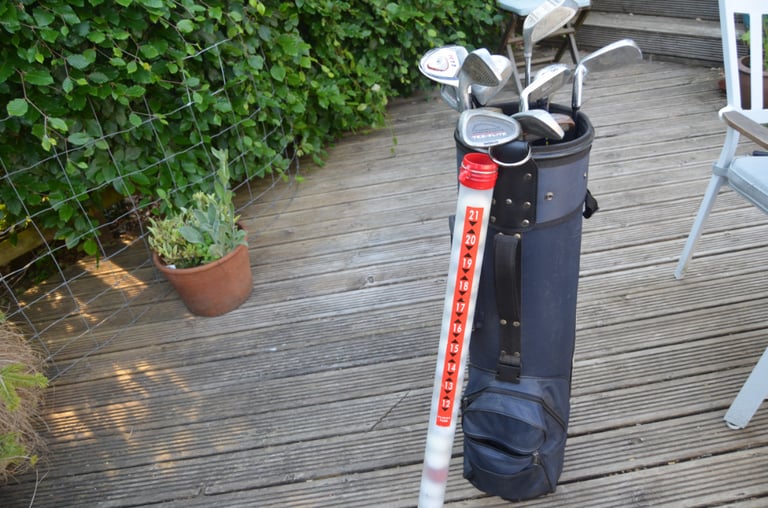 13 golf clubs with bag and balls