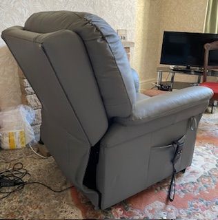 Dual motor rise and recline armchair.