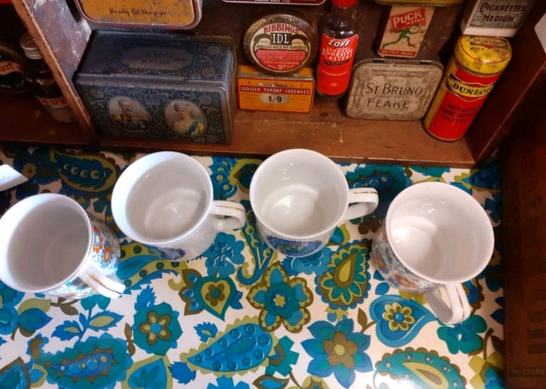 Unused retro mugs. Has gold coloured edging. Made in Poland. 