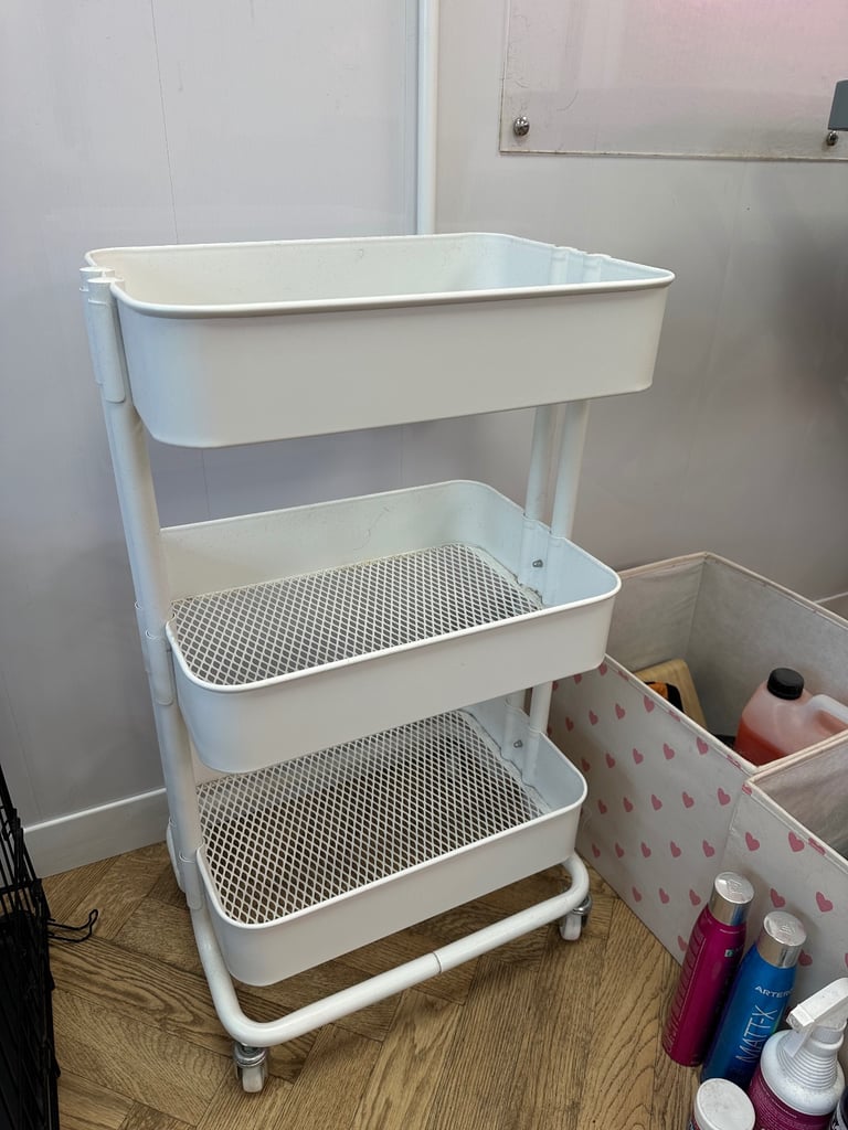 White wheeled trolley 