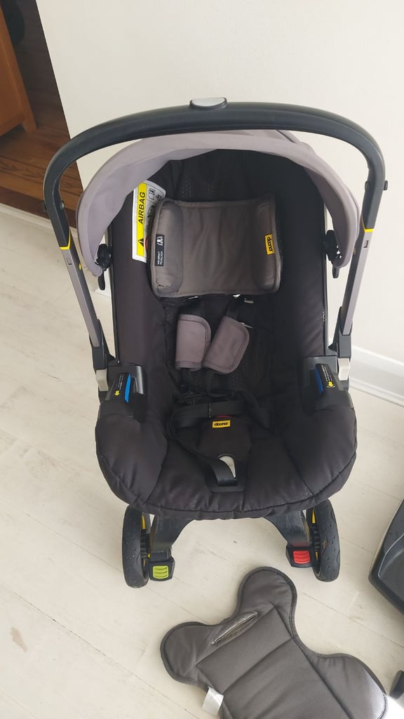 Doona pushchair car seat buggy travel school trips a must have, rain cover,isofix,nappy bag,