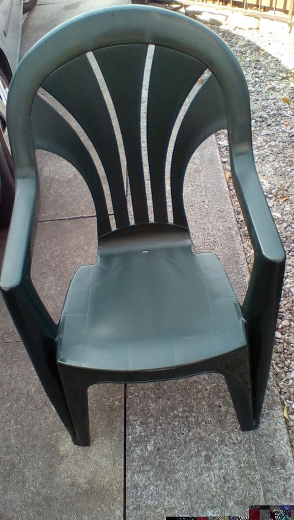 image for Three plastic garden chairs