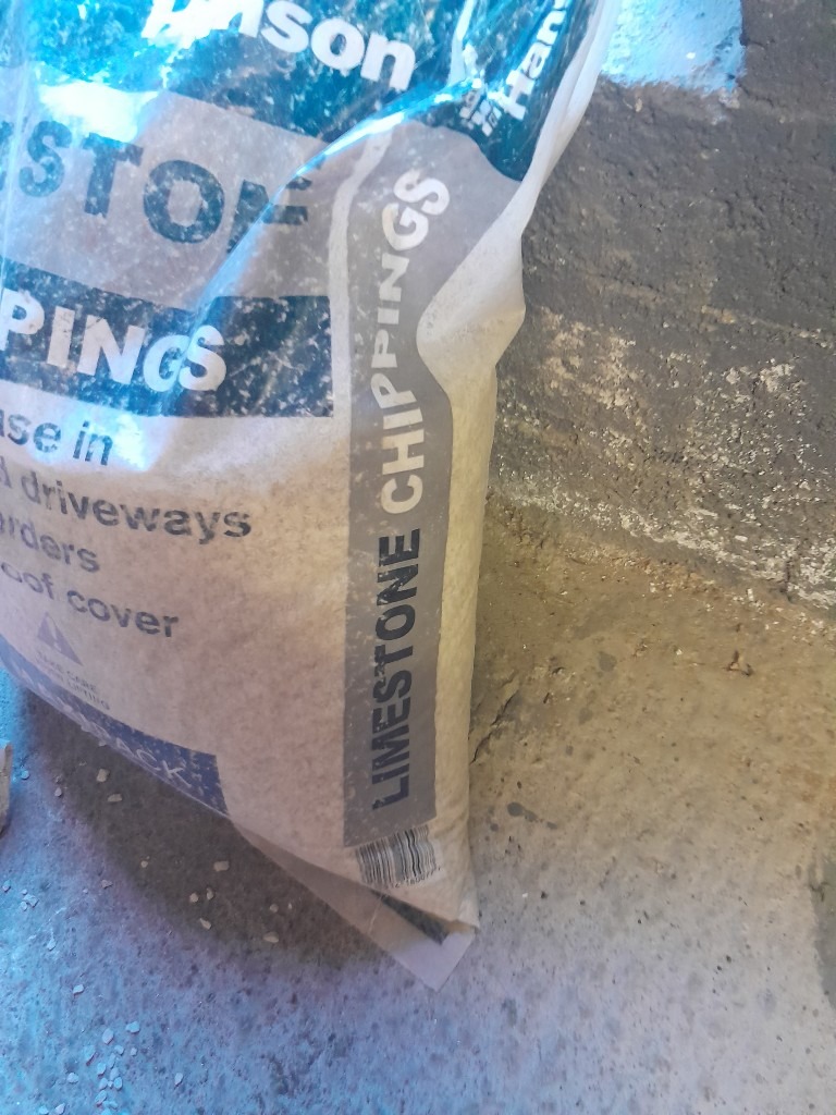 Full Roll Denso Protective Tape and Nearly Full bag Of Lime Soakaway Chippings