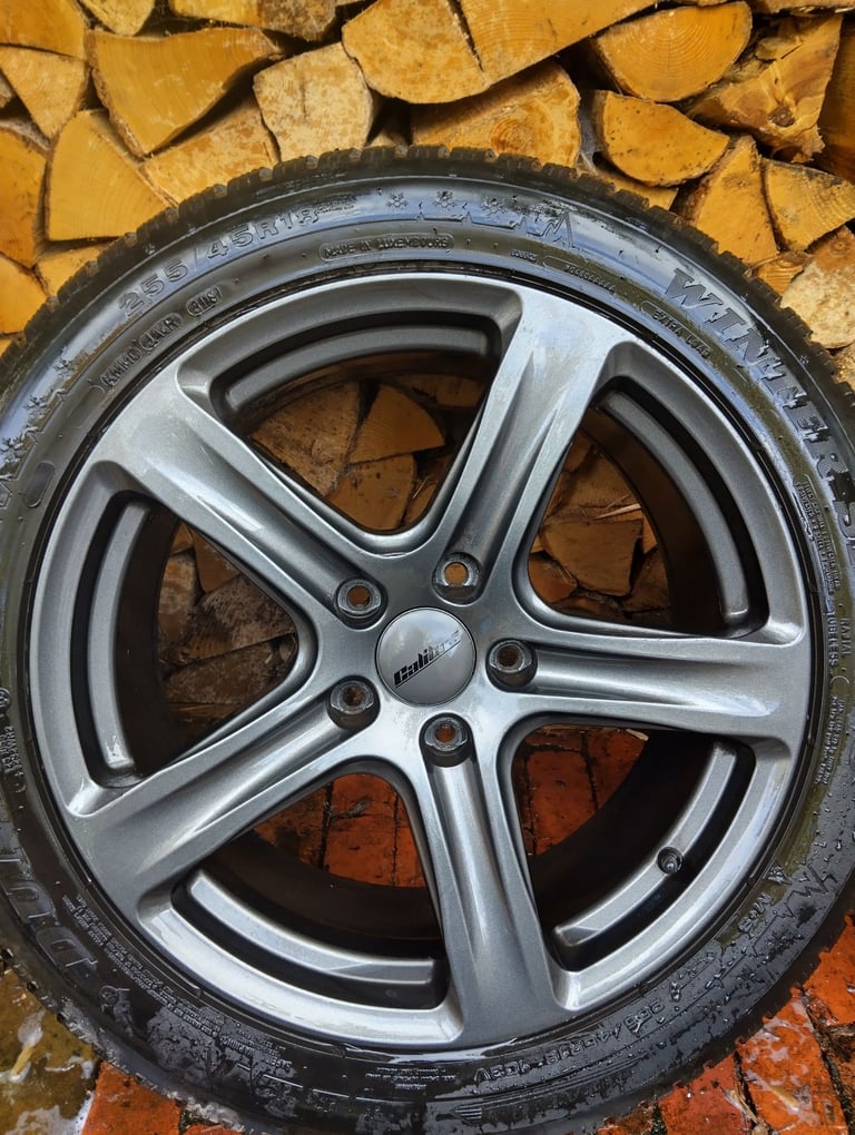 18' Calibre Gunmetal Grey Alloys with Dunlop Winter Sports 255/45r18 winter tyres 