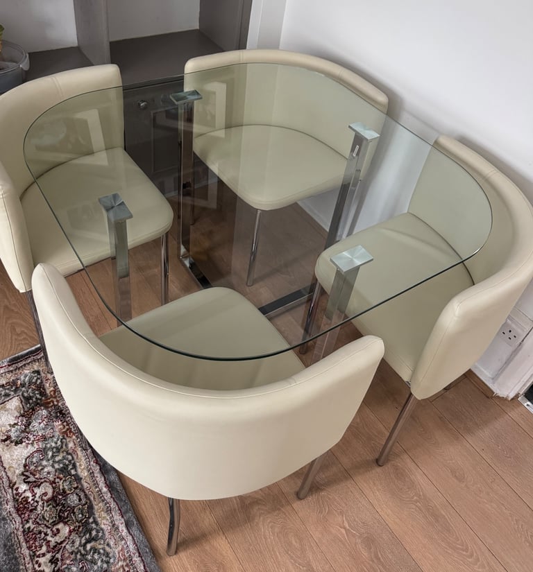 RRP £600 Stowaway dining table in cream finish with 4 chairs in excellent condition like new 
