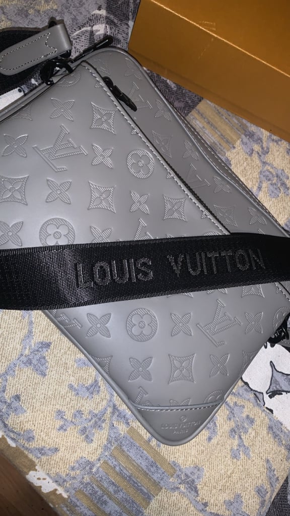 L V Messneger bag