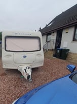 2004 Bailey Discovery. Well looked after 4 berth caravan with full sizr awning