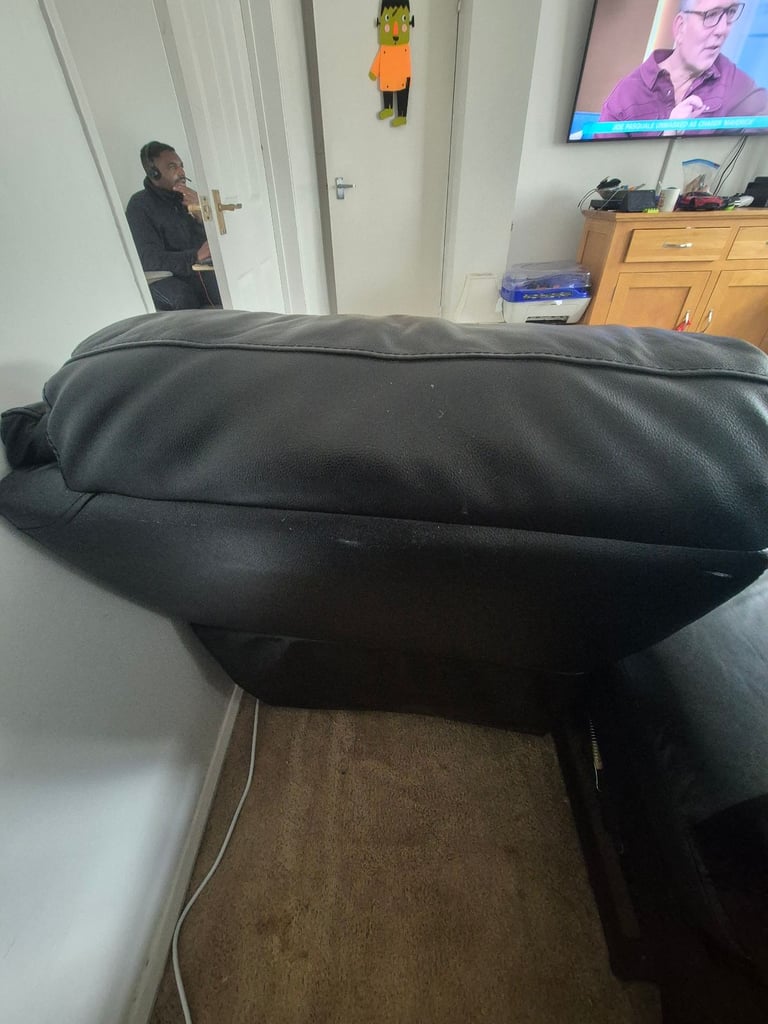 Two seater leather reclining sofa