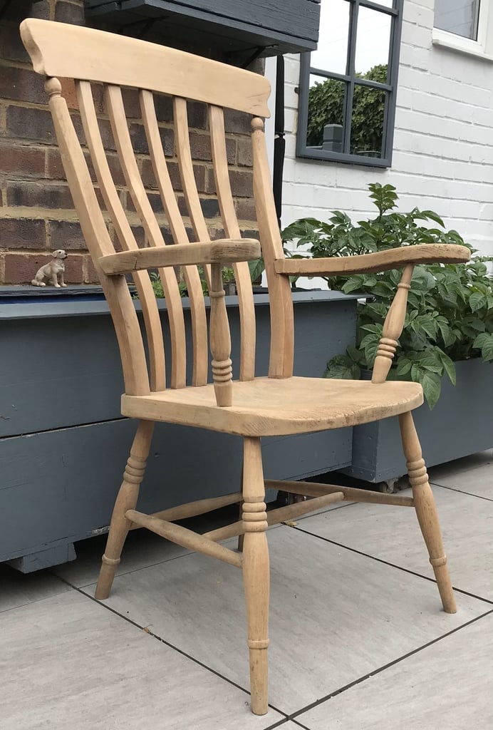 AN ANTIQUE VICTORIAN FARMHOUSE ARMCHAIR
