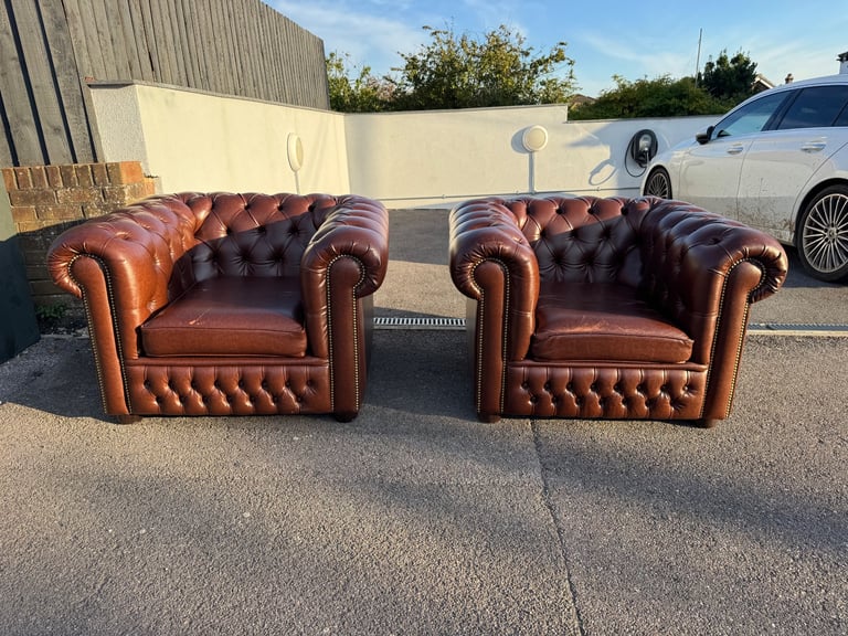 Pair of chesterfield faux brown leather club armchairs 